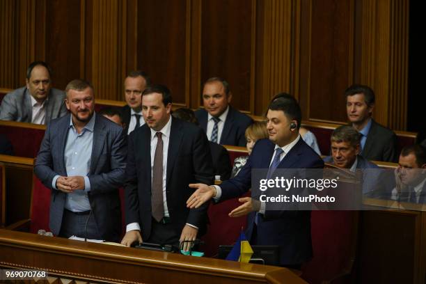 Prime Minister Volodymyr Groysman applauses after the positive voting on the anticorruption court bill during the session of Parliament in Kyiv,...