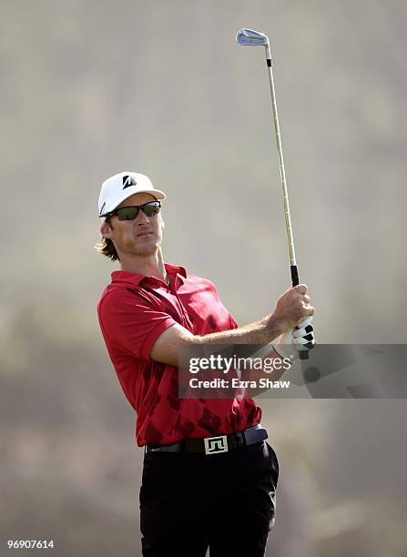 Will MacKenzie hits his approach shot on the 15th hole during round two of the AT&T Pebble Beach National Pro-Am at Monterey Peninsula Country Club...