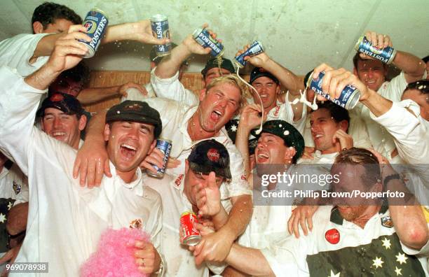 The Australian team celebrate with a few beers in the dressing room after winning the 4th Test match between England and Australia at Headingley,...