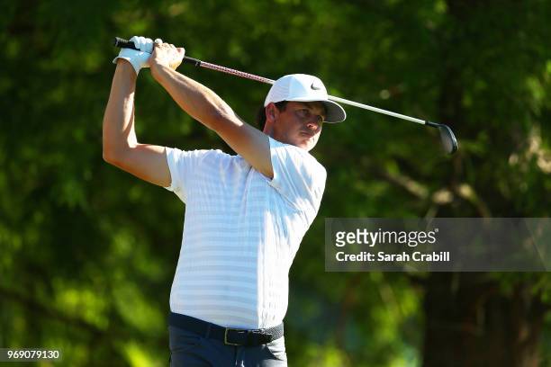 Cody Gribble of the United States plays his shot from the 12th tee during the first round of the FedEx St. Jude Classic at TPC Southwind on June 7,...