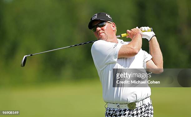 John Daly hits his drive on the ninth hole during the third round of the Mayakoba Golf Classic at El Camaleon Golf Club held on February 20, 2010 in...