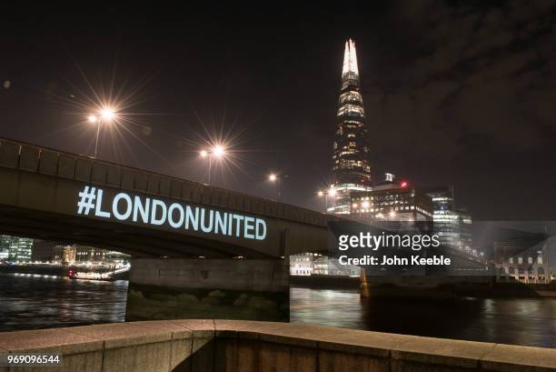 London Bridge is lit up with the Hashtag #LONDONUNITED on the first anniversary of the London Bridge terror attack on June 3, 2018 in London,...