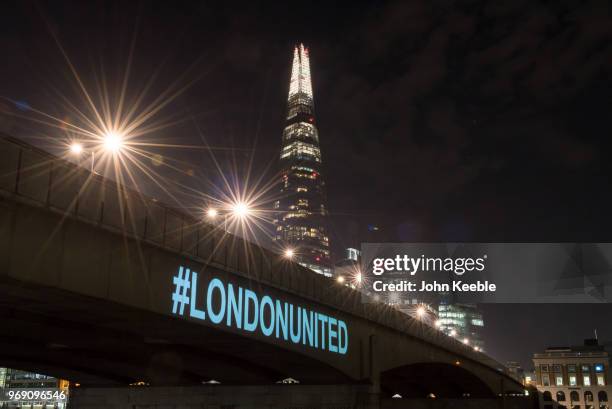 London Bridge is lit up with the Hashtag #LONDONUNITED on the first anniversary of the London Bridge terror attack on June 3, 2018 in London,...