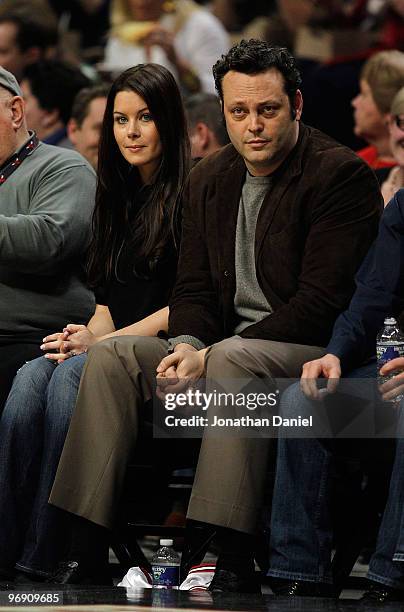 Actor Vince Vaughn and his wife Kyla Weber take in a game between the Chicago Bulls and the Philadelphia 76ers at the United Center on February 20,...