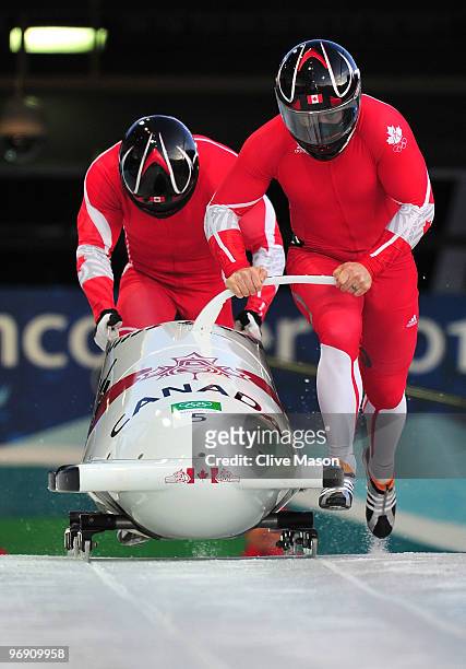 Lyndon Rush and Lascelles Brown of Canada - one compete in the men's bobsleigh two-man heat one on day 9 of the 2010 Vancouver Winter Olympics at the...