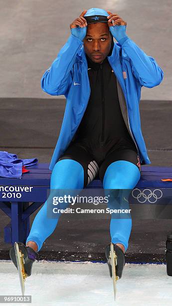 Shani Davis of the United States waits for his skate in the men's speed skating 1500 m finalon day 9 of the Vancouver 2010 Winter Olympics at...
