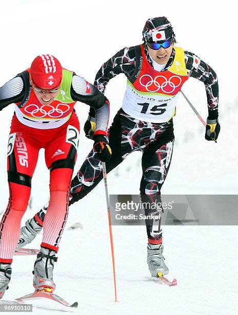 Madoka Natsumi of Japan compete in the Women's Cross Country Skiing Sprint semi final on Day 12 of the 2006 Turin Winter Olympic Games on February...