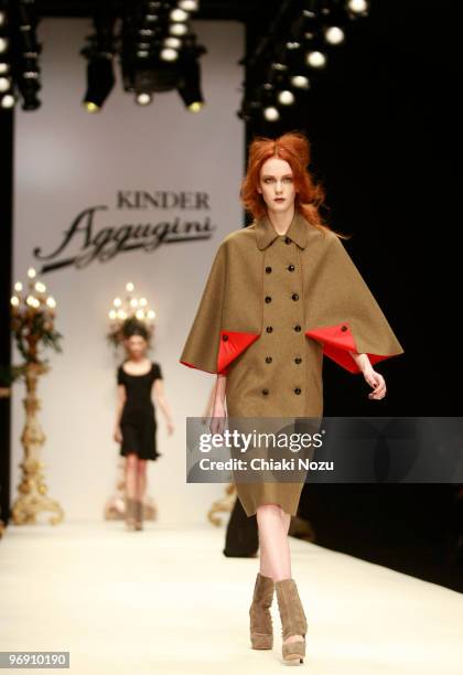 Model walks the runway at the Kinder Aggugini show for London Fashion Week Autumn/Winter 2010 at Somerset House on February 20, 2010 in London,...