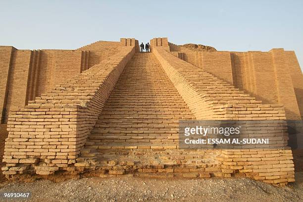 Iraq-archaeology-tourism,FEATURE, by Mehdi Lebouachera People visit the stepped Ziggurat temple, a three-tiered edifice dating back to 2113 BC, in...