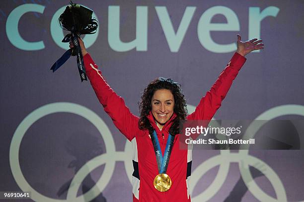 Amy Williams of Great Britain and Northern Ireland receives the gold medal during the medal ceremony for the women's skeleton held at the Whistler...