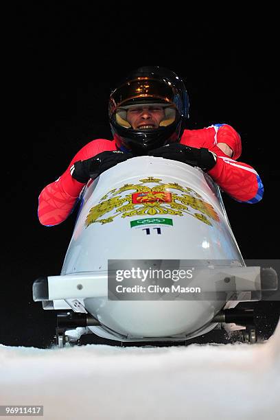 Dmitry Abramovich and Sergey Prudnikov of Russia compete in Russia-2 during the men's bobsleigh two-man heat two on day 9 of the 2010 Vancouver...