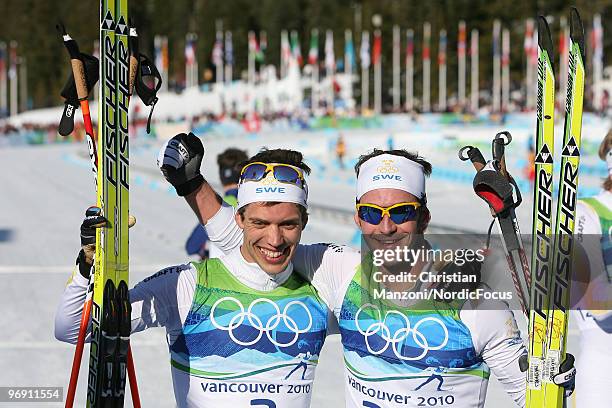 Olympic champion Marcus Hellner of Sweden with Anders Soedergren of Sweden during the men's 30km pursuit at the Olympic Winter Games Vancouver 2010...