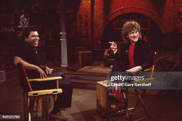 Jackson shares a laugh with British Rock musician Robert Plant during an interview at MTV Studios, New York, New York, June 22, 1982.