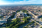 Wide aerial drone shot of national palace of culture in Sofia city downtown district