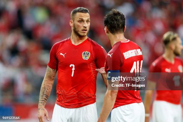 Marko Arnautovic of Austria and Julian Baumgartlinger of Austria diskussion during the international friendly match between Austria and Germany at...