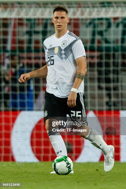 Niklas Suele of Germany in action during the international friendly match between Austria and Germany at Woerthersee Stadion on June 2, 2018 in...