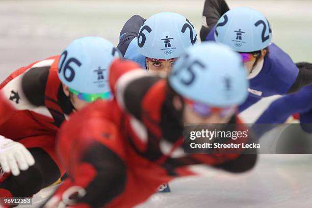 Apolo Anton Ohno of the United States competes on his way to winning the bronze medal during the Short Track Speed Skating Men's 1000m Final on day 9...