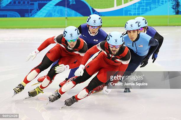 Francois Hamelin of Canada, Lee Jung-Su of South Korea, Charles Hamelin of Canada, Apolo Anton Ohno of the United States and Lee Ho-Suk of South...