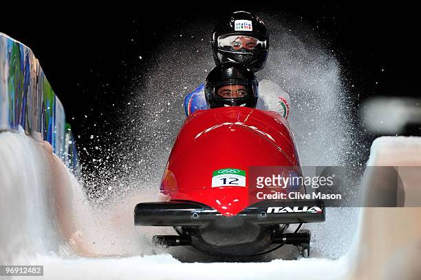 Simone Bertazzo and Samuele Romanini of Italy compete in Italy-1 during the men's bobsleigh two-man heat two on day 9 of the 2010 Vancouver Winter...