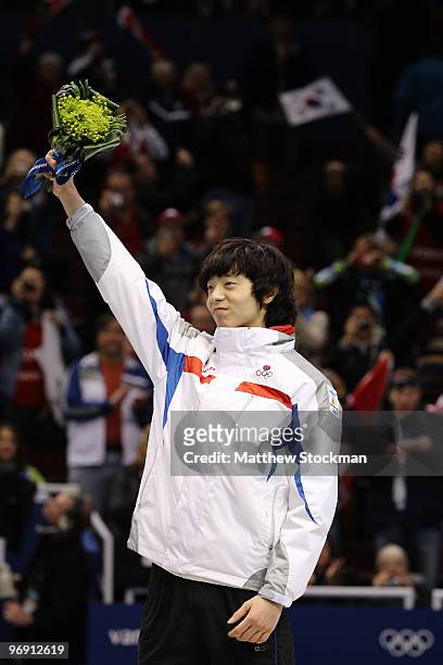 Lee Jung-Su of South Korea celebrates winning the gold medal during the Short Track Speed Skating Men's 1000m Final on day 9 of the Vancouver 2010...
