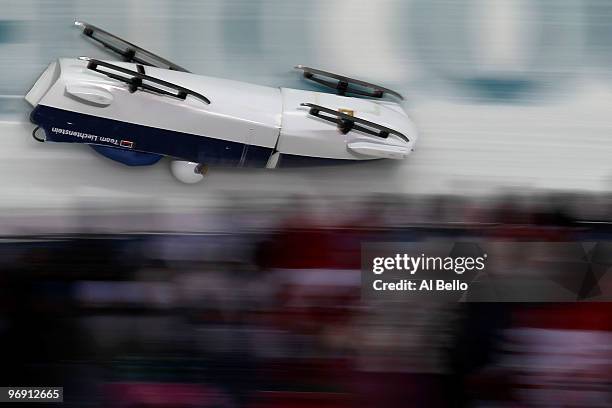 Michael Klingler and Thomas Duerr of Liechtenstein in Liechtenstein-1 slide out of control down the course during the men's bobsleigh two-man heat...