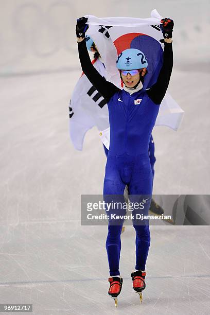 Lee Jung-Su of South Korea celebrates winning the gold medal during the Short Track Speed Skating Men's 1000 m on day 9 of the Vancouver 2010 Winter...