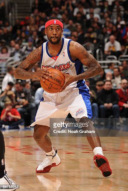 Bobby Brown of the Los Angeles Clippers looks to make a pass during a game against the Sacramento Kings at Staples Center on February 20, 2010 in Los...
