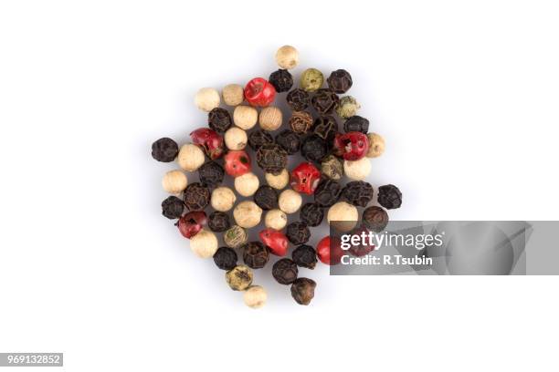 heap of various pepper peppercorns seeds mix on white - allspice stock pictures, royalty-free photos & images