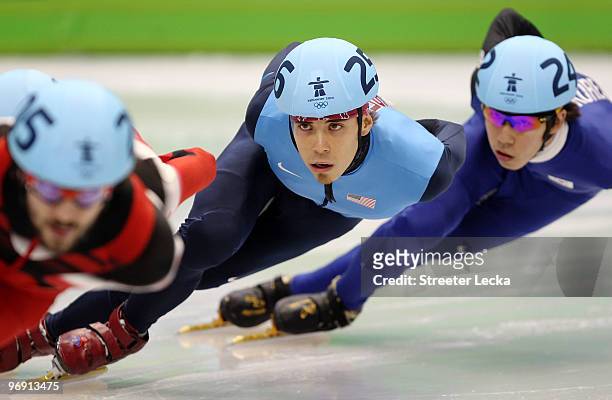 Apolo Anton Ohno of the United States competes on his way to winning the bronze medal during the Short Track Speed Skating Men's 1000m Final on day 9...