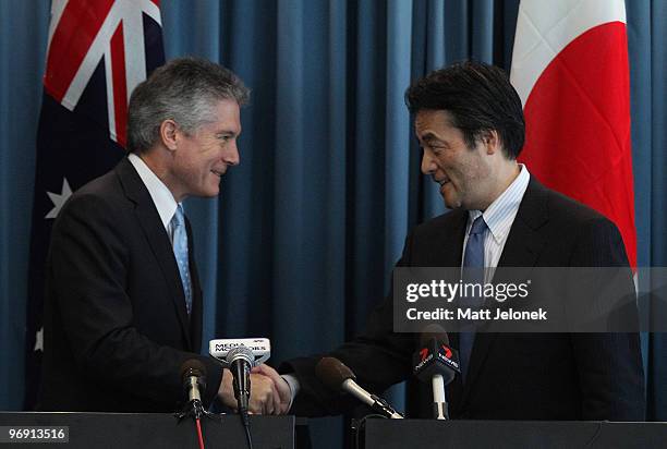 Australia Minister for Foreign Affairs Stephen Smith and Japan's Minister For Foreign Affairs Katsuya Okada shake hands at Exchange Plaza on February...