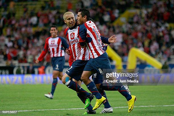 Chiva's player Adolfo Bautista and Alberto Medina celebrate scored goal against Puebla during their match in the Bicentenario 2010 tournament, the...