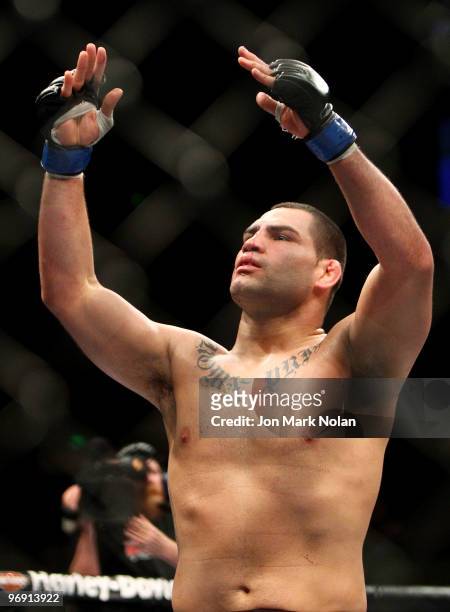 Fighter Cain Velasquez celebrates winning his fight against UFC fighter Minotauro Nogueira during their Ultimate Fighting Championship world...