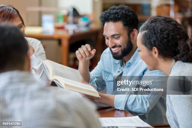 group of students studying together - book club stock pictures, royalty-free photos & images