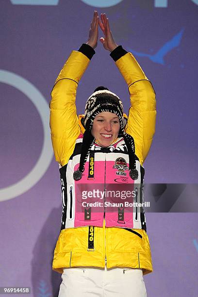 Anja Huber of Germany receives the bronze medal during the medal ceremony for the women's skeleton held at the Whistler Medals Plaza on day 9 of the...