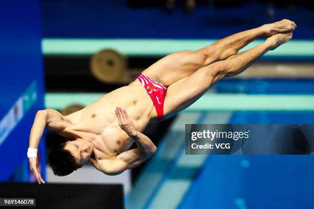 Cao Yuan of China competes in the Men's 3m Springboard final on day three of the 21st FINA Diving World Cup 2018 at Natatorium of Wuhan Sports Center...