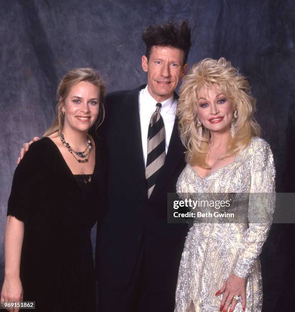 Country singer and songwriter Mary Chapin Carpenter, Lyle Lovett, and Dolly Parton backstage before the CMA Award Show Backstage October 10, 1988 in...