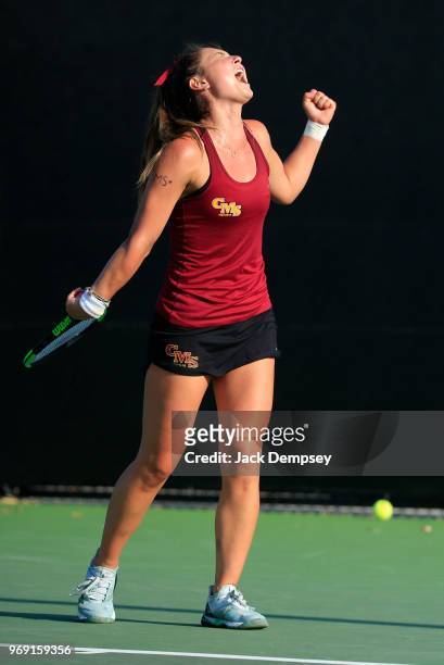 Catherine Allen of the Claremont-Mudd-Scripps Athenas reacts after winning a point against Bridget Harding of the Emory Eagles during the Division...