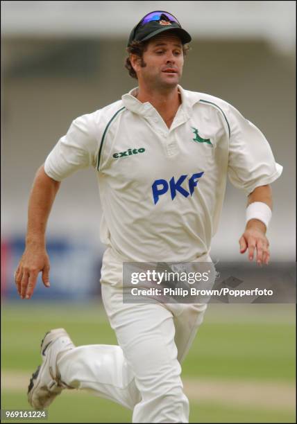 Chris Cairns of Nottinghamshire and New Zealand runs in the field during a match at Trent Bridge, Nottingham, circa 2003.