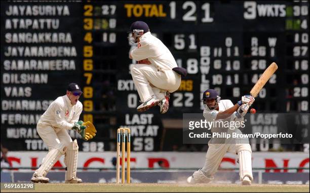 Paul Collingwood of England leaps to avoid a shot from Tillakaratne Dilshan of Sri Lanka during his innings of 100 runs in the 2nd Test match between...