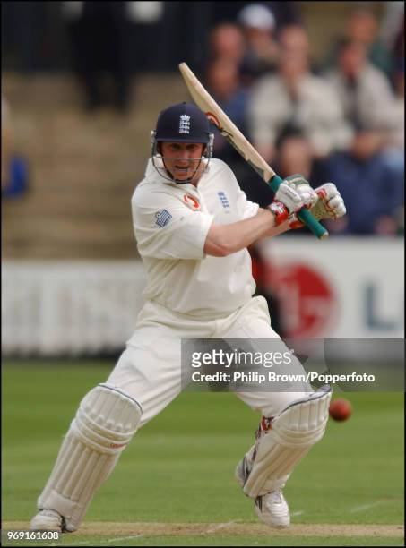 Anthony McGrath of England hits out during his innings of 69 runs on debut in the 1st Test match between England and Zimbabwe at Lord's Cricket...