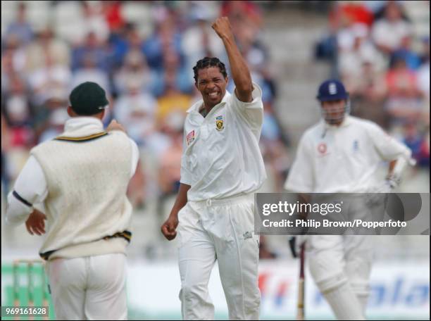 Makhaya Ntini of South Africa celebrates the wicket of Mark Butcher of England during the 1st Test match between England and South Africa at...