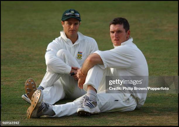 Mark Boucher and Graeme Smith of South Africa stretching at the end of the day's play during the 4th Test match between England and South Africa at...