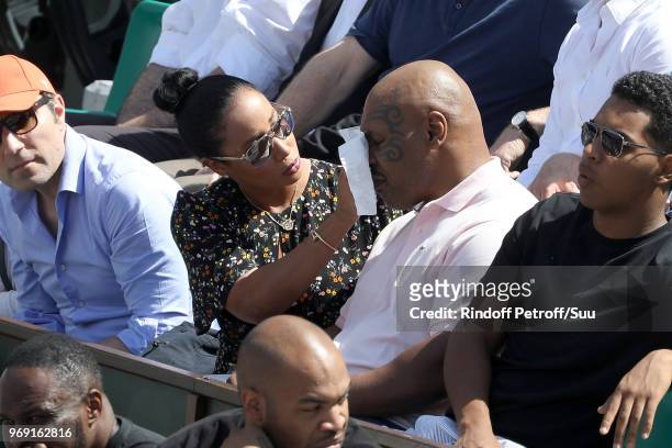 Former heavyweight champion Mike Tyson and his wife Lakiha attend the 2018 French Open - Day Twelve at Roland Garros on June 7, 2018 in Paris, France.