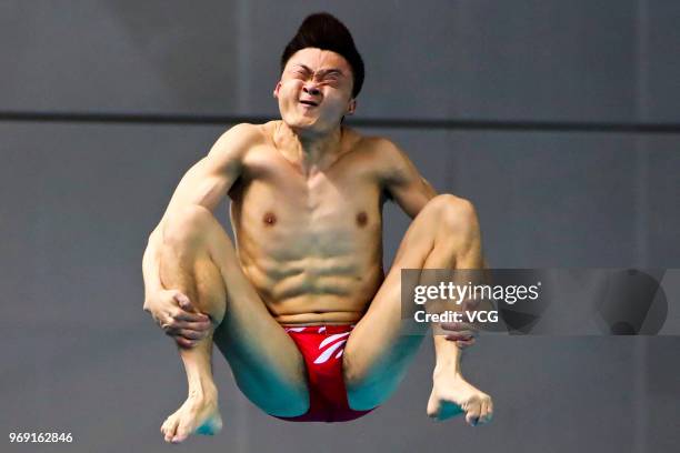 Cao Yuan of China competes in the Men's 3m Springboard final on day three of the 21st FINA Diving World Cup 2018 at Natatorium of Wuhan Sports Center...