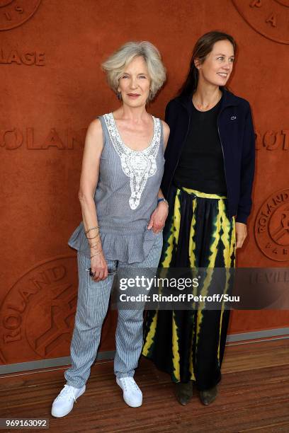 Actress Marie-Christine Adam and Eloise Lang attend the 2018 French Open - Day Twelve at Roland Garros on June 7, 2018 in Paris, France.