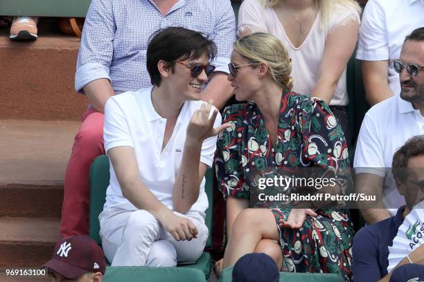 Alain-Fabien Delon and Kiera Chaplin attend the 2018 French Open - Day Twelve at Roland Garros on June 7, 2018 in Paris, France.