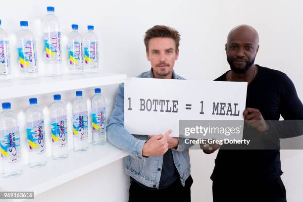 Actors Sammi Rotibi and Riley Smith showcase Sababa Water at the Giveback Day at TAP - The Artists Project on June 6, 2018 in Los Angeles, California.