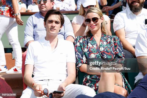 Alain-Fabien Delon and Kiera Chaplin attend the 2018 French Open - Day Twelve at Roland Garros on June 7, 2018 in Paris, France.