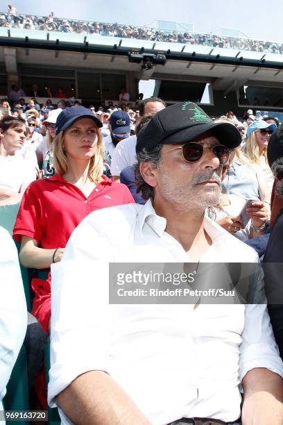 Actors Margot Bancilhon and Pascal Elbe attend the 2018 French Open - Day Twelve at Roland Garros on June 7, 2018 in Paris, France.
