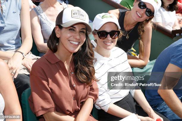 Actresses Reem Kherici and Melanie Bernier attend the 2018 French Open - Day Twelve at Roland Garros on June 7, 2018 in Paris, France.